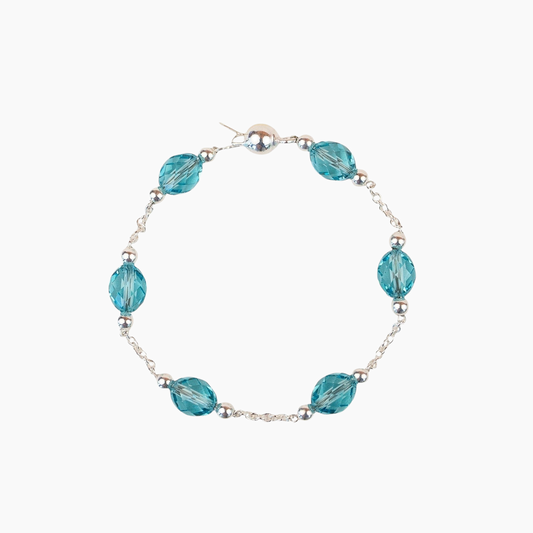 Bracelet Lafève en argent massif avec perles de cristal bleu aqua facettées de la collection Facettes Silver